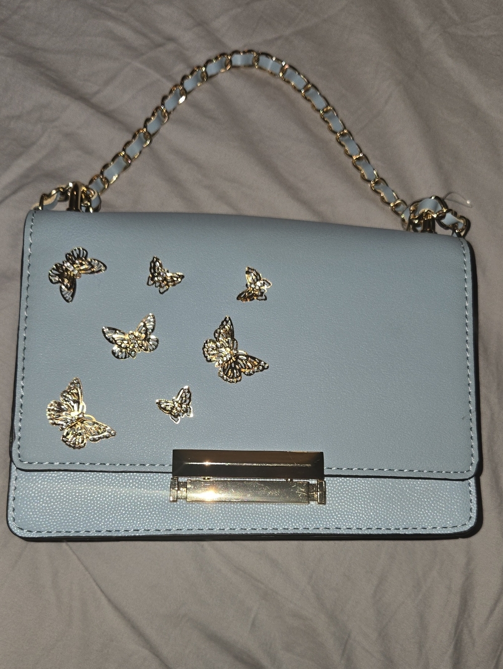ALDO Light Blue Crossbody Bag with Gold Butterfly Accents
